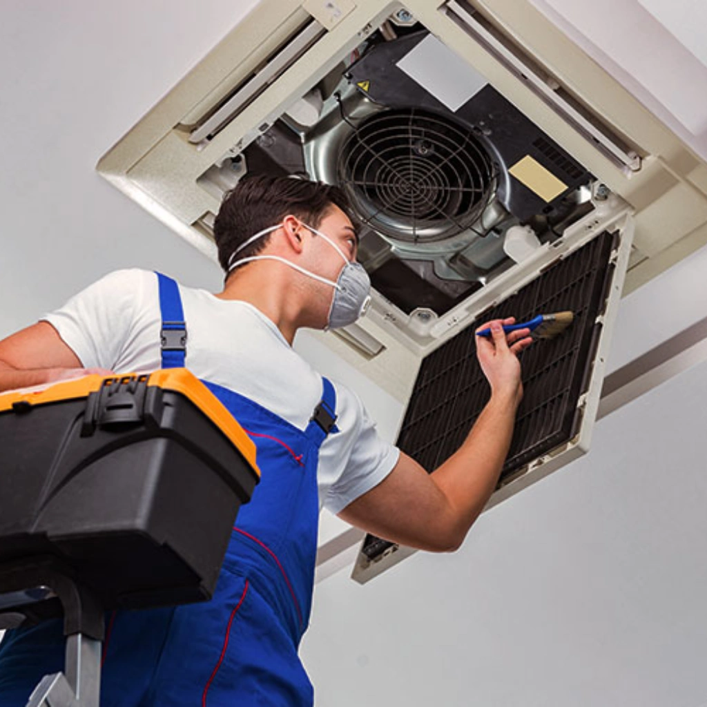 AC Repair 1 HVAC tech servicing air conditioner